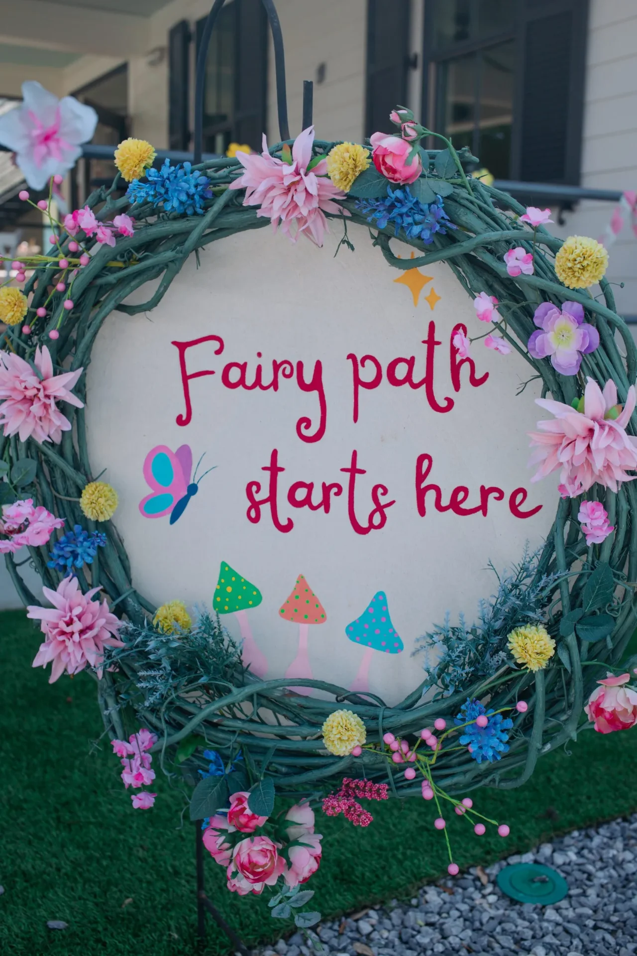 Floral wreath signage — Fairy path starts here